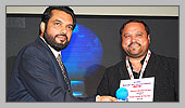Mr. L. Radhakrishnan, Chairman of JNPT presenting awards to Mr. Kalesh Gandhi